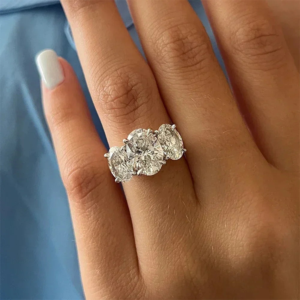 3-Stone Oval Cut Moissanite Engagement Ring in 925 Sterling Silver (3/6 ct total carat weight) with Certificate